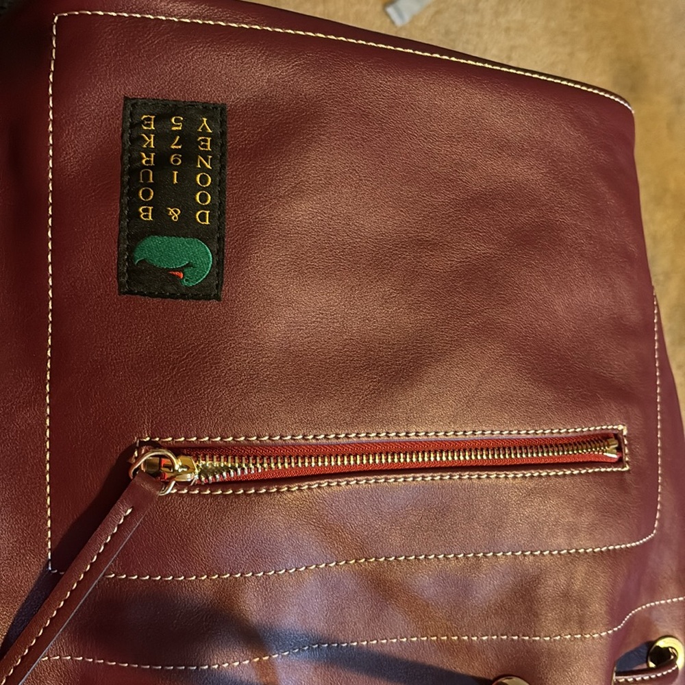 Dooney and Burke Drawstringng Backpack in color Grape. - Picture 12 of 12